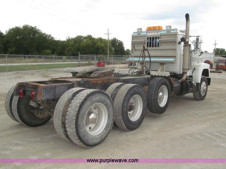 image for item F7122 1985 Mack RD688S Econodyne triple axle semi truck