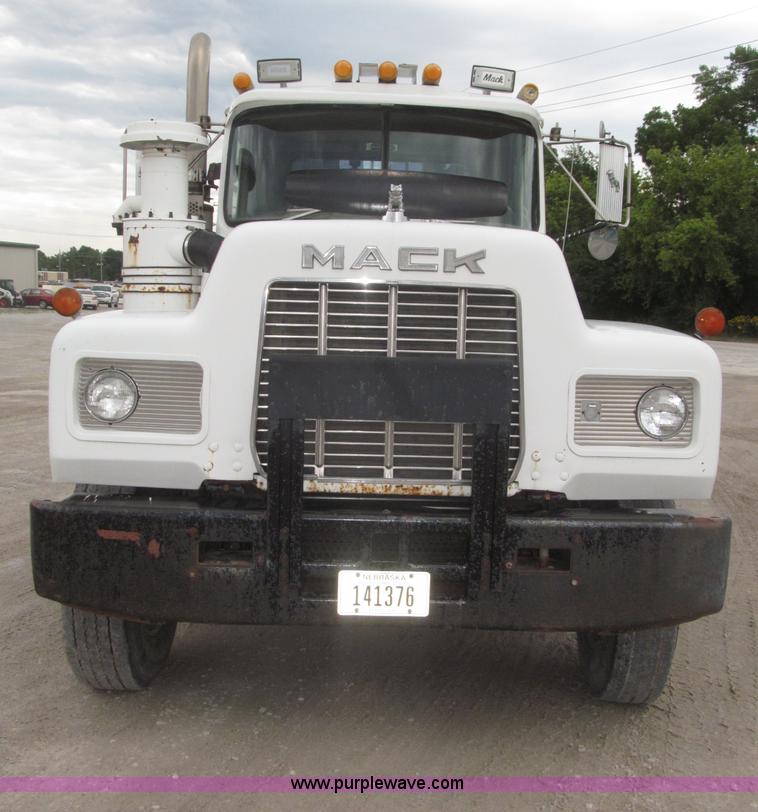 image for item F7122 1985 Mack RD688S Econodyne triple axle semi truck