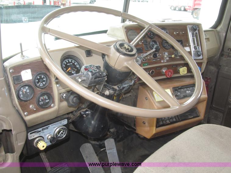 image for item F7122 1985 Mack RD688S Econodyne triple axle semi truck