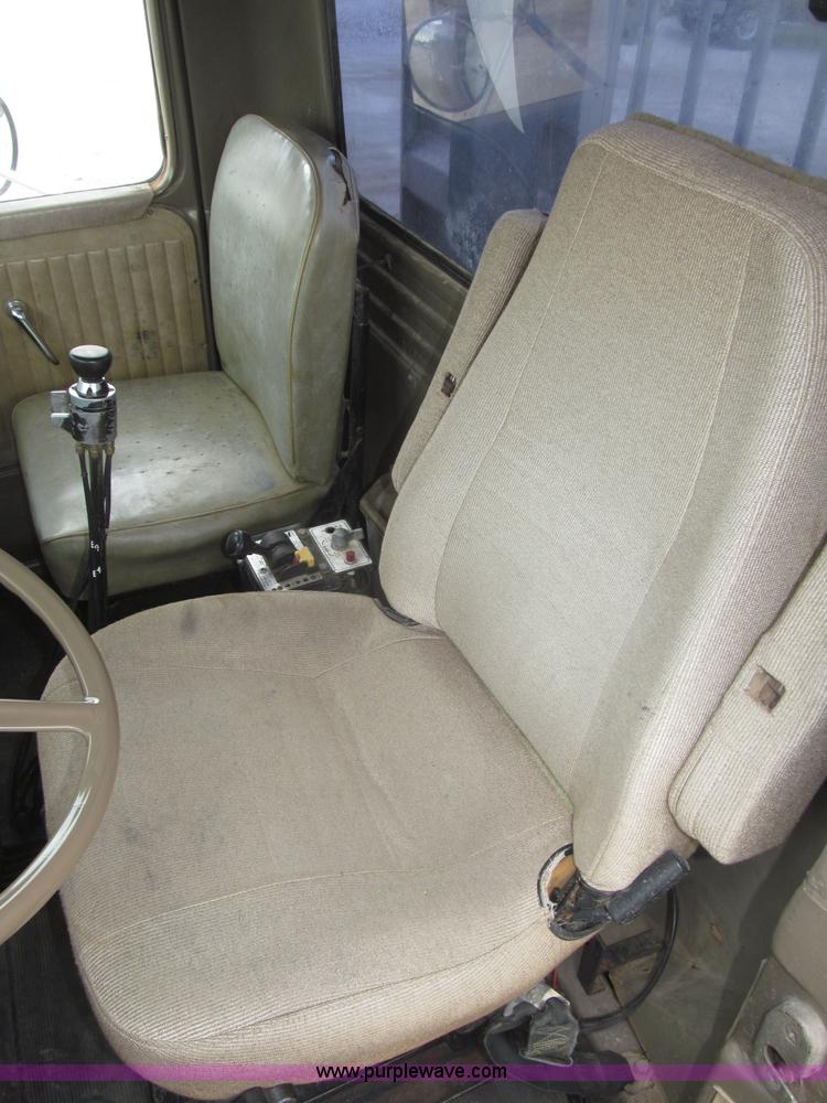 image for item F7122 1985 Mack RD688S Econodyne triple axle semi truck