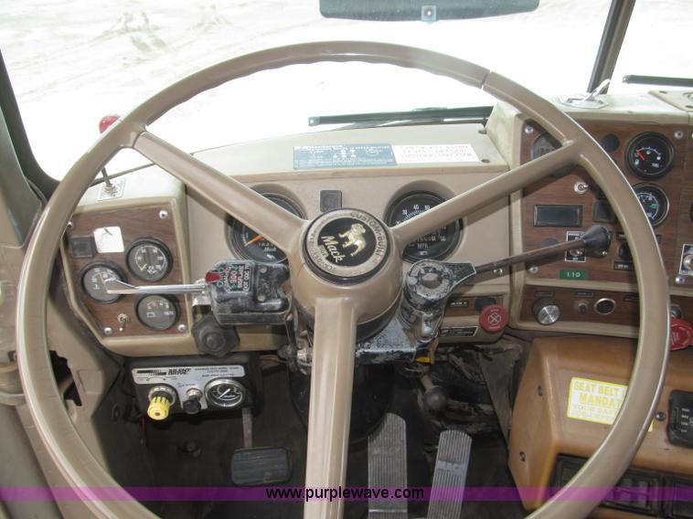 image for item F7122 1985 Mack RD688S Econodyne triple axle semi truck