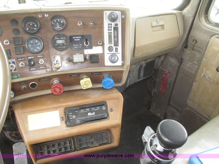 image for item F7122 1985 Mack RD688S Econodyne triple axle semi truck