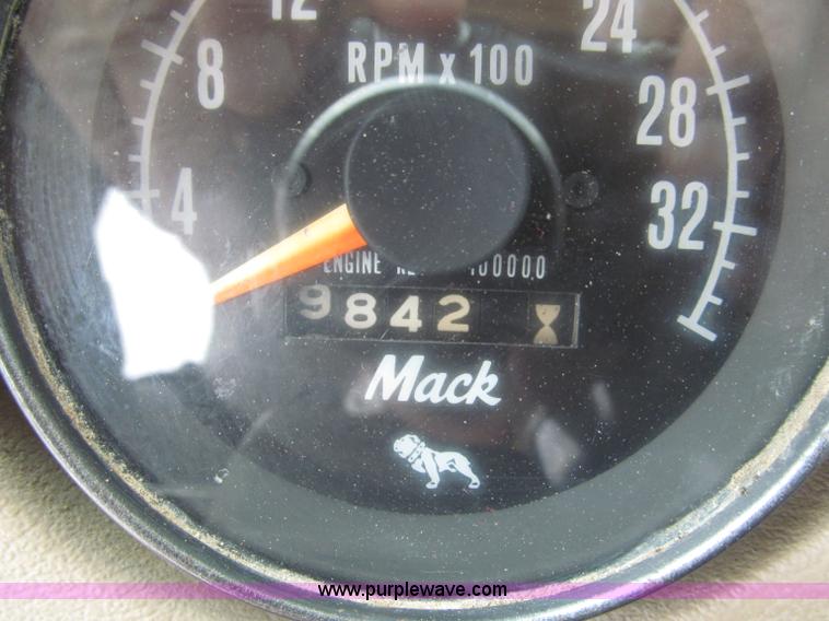 image for item F7122 1985 Mack RD688S Econodyne triple axle semi truck