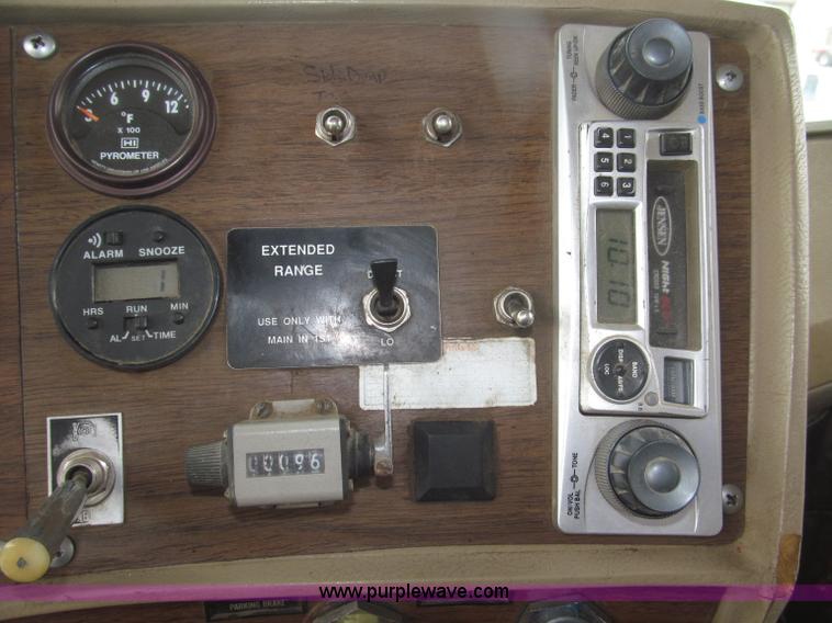 image for item F7122 1985 Mack RD688S Econodyne triple axle semi truck