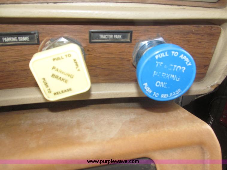 image for item F7122 1985 Mack RD688S Econodyne triple axle semi truck