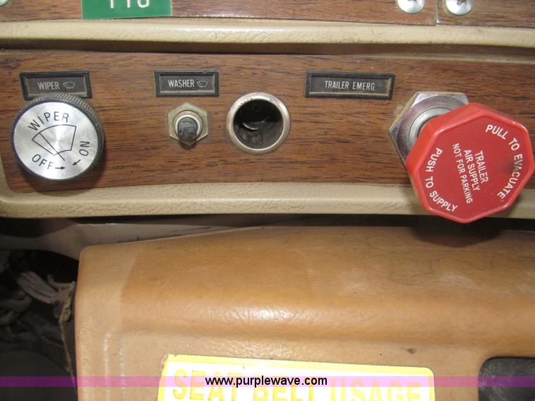 image for item F7122 1985 Mack RD688S Econodyne triple axle semi truck