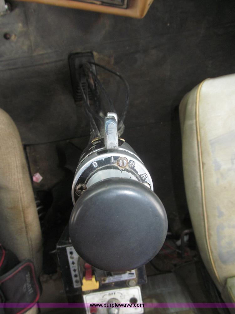 image for item F7122 1985 Mack RD688S Econodyne triple axle semi truck