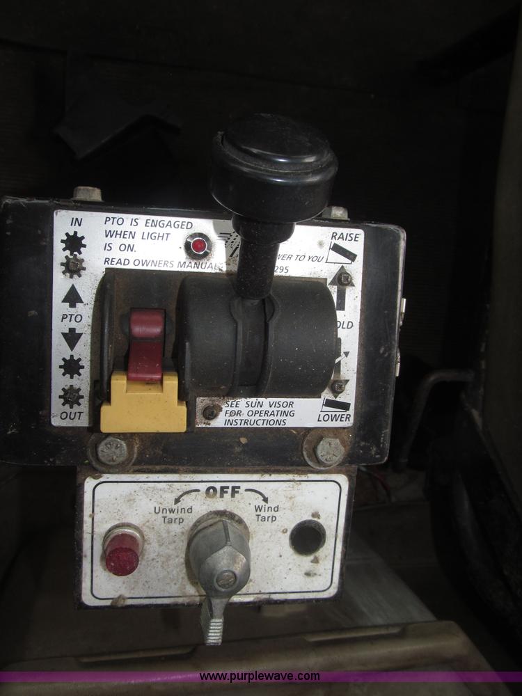 image for item F7122 1985 Mack RD688S Econodyne triple axle semi truck