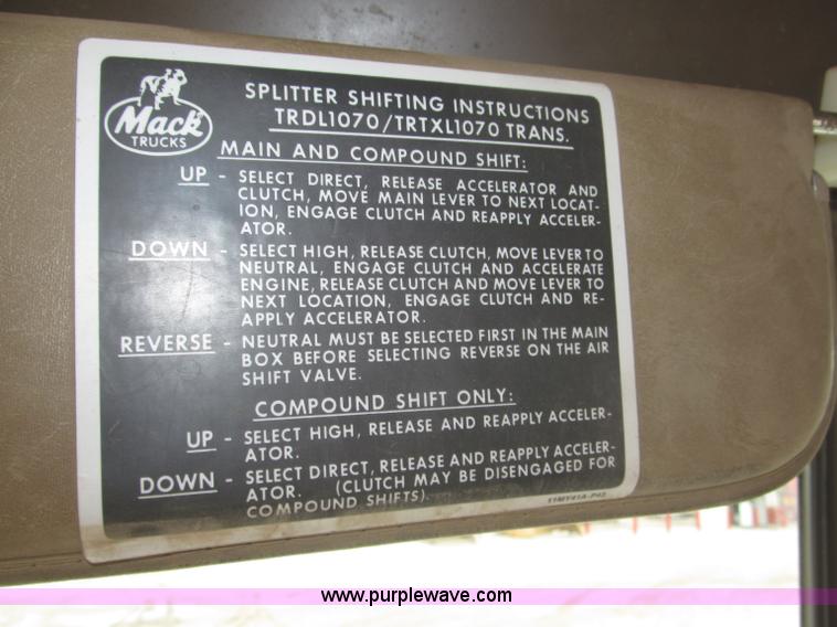 image for item F7122 1985 Mack RD688S Econodyne triple axle semi truck