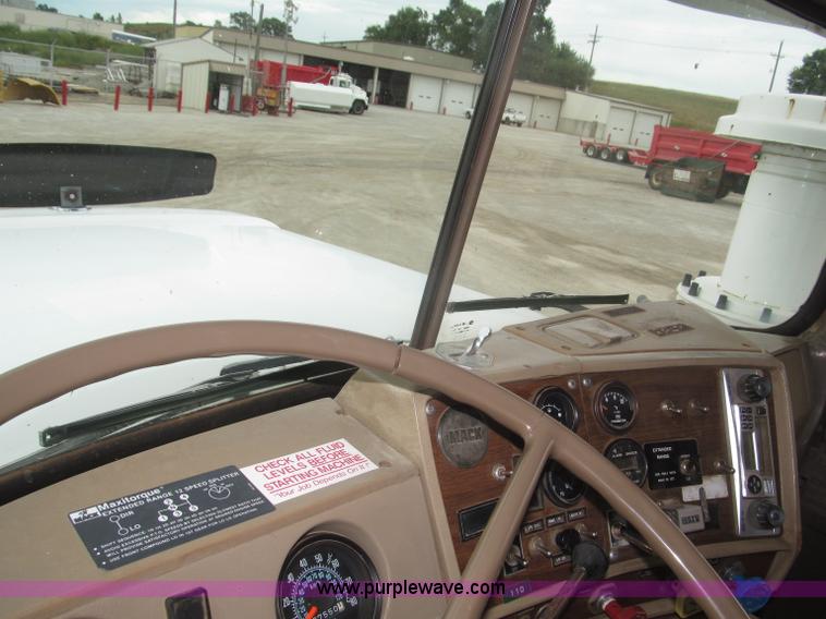 image for item F7122 1985 Mack RD688S Econodyne triple axle semi truck