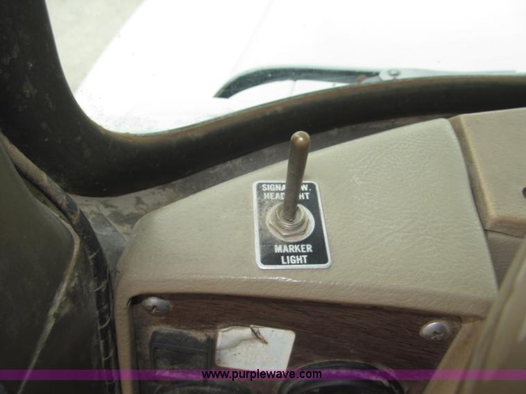 image for item F7122 1985 Mack RD688S Econodyne triple axle semi truck