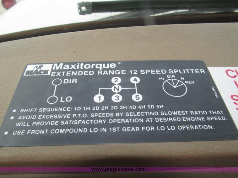 image for item F7122 1985 Mack RD688S Econodyne triple axle semi truck