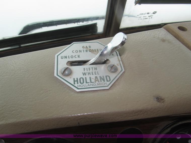 image for item F7122 1985 Mack RD688S Econodyne triple axle semi truck