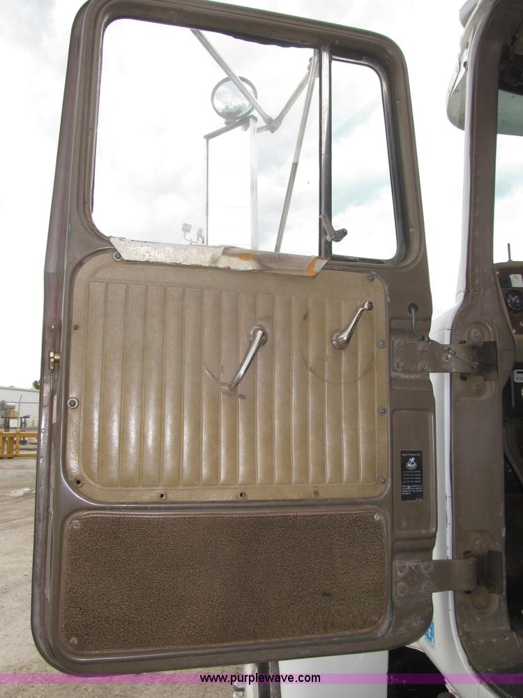 image for item F7122 1985 Mack RD688S Econodyne triple axle semi truck