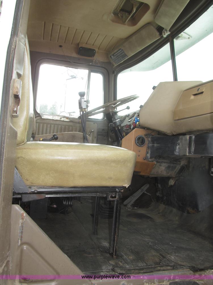 image for item F7122 1985 Mack RD688S Econodyne triple axle semi truck