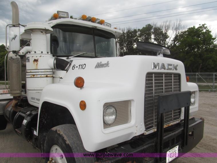 image for item F7122 1985 Mack RD688S Econodyne triple axle semi truck