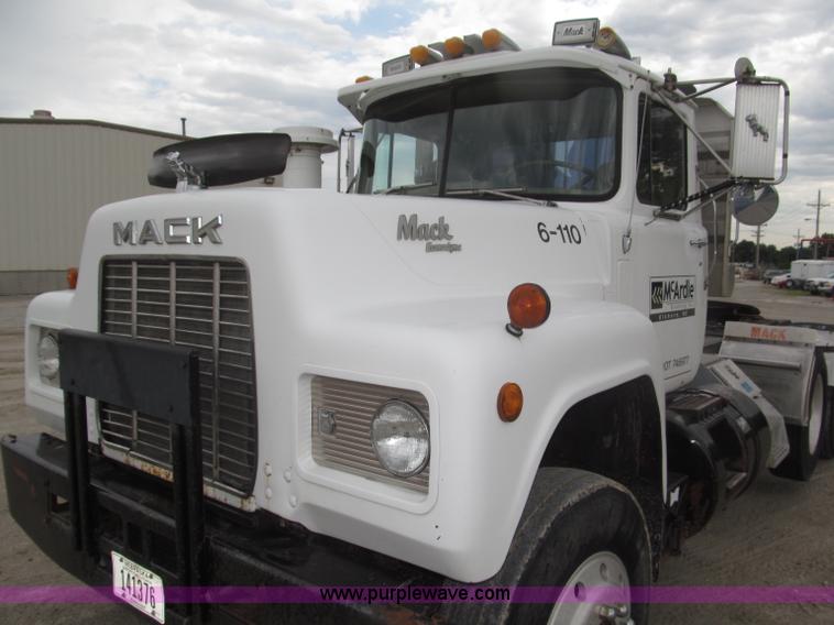 image for item F7122 1985 Mack RD688S Econodyne triple axle semi truck