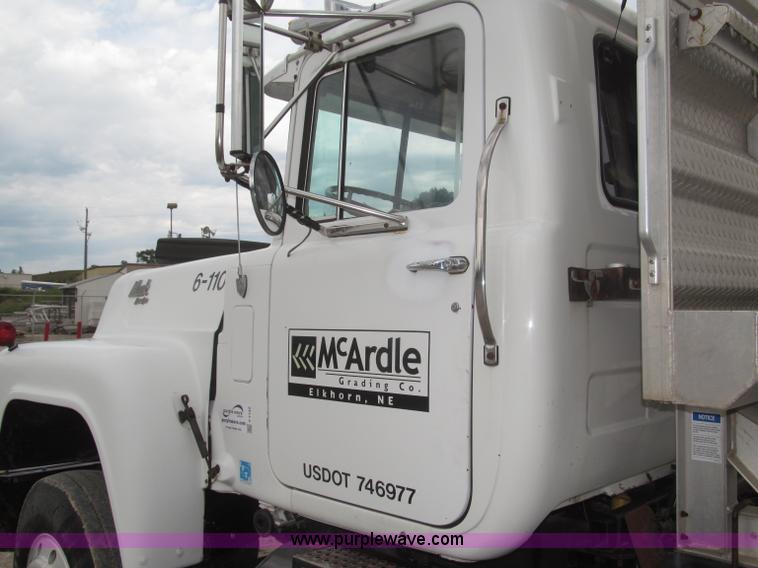 image for item F7122 1985 Mack RD688S Econodyne triple axle semi truck