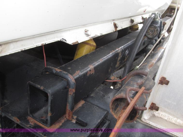 image for item F7122 1985 Mack RD688S Econodyne triple axle semi truck