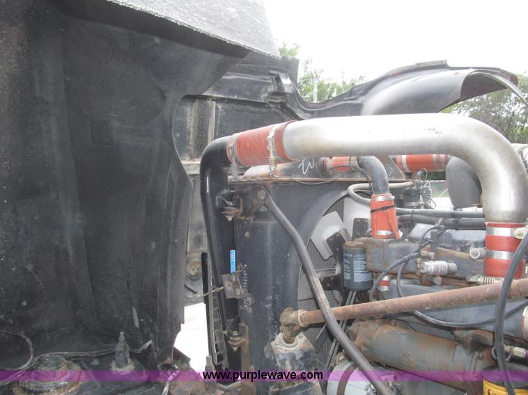 image for item F7122 1985 Mack RD688S Econodyne triple axle semi truck