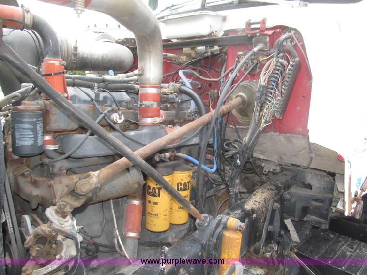 image for item F7122 1985 Mack RD688S Econodyne triple axle semi truck