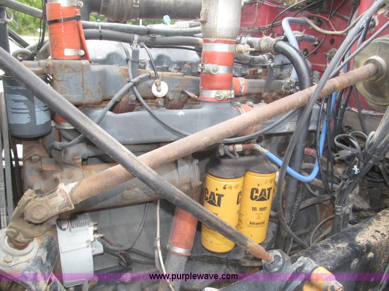 image for item F7122 1985 Mack RD688S Econodyne triple axle semi truck