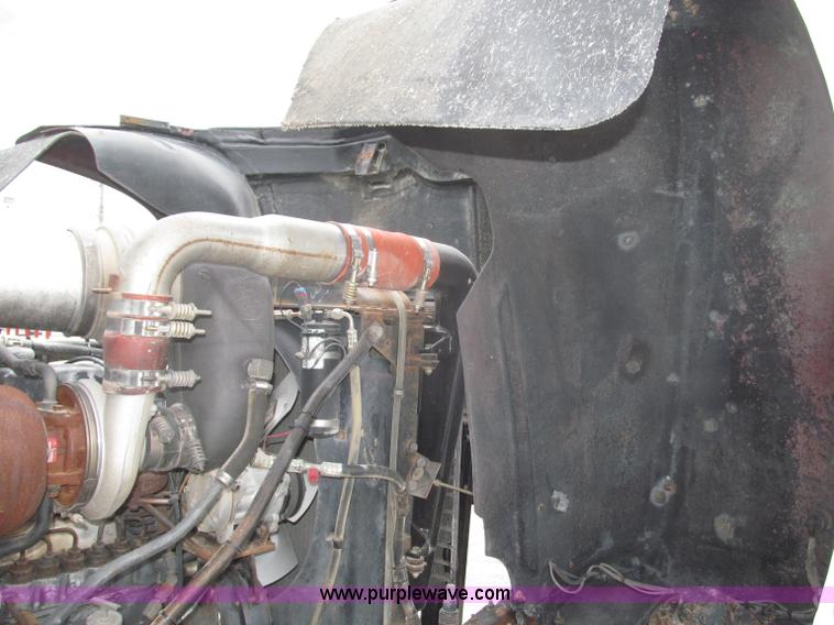 image for item F7122 1985 Mack RD688S Econodyne triple axle semi truck