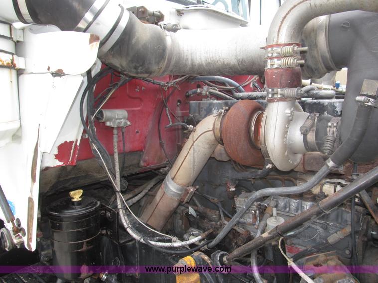 image for item F7122 1985 Mack RD688S Econodyne triple axle semi truck