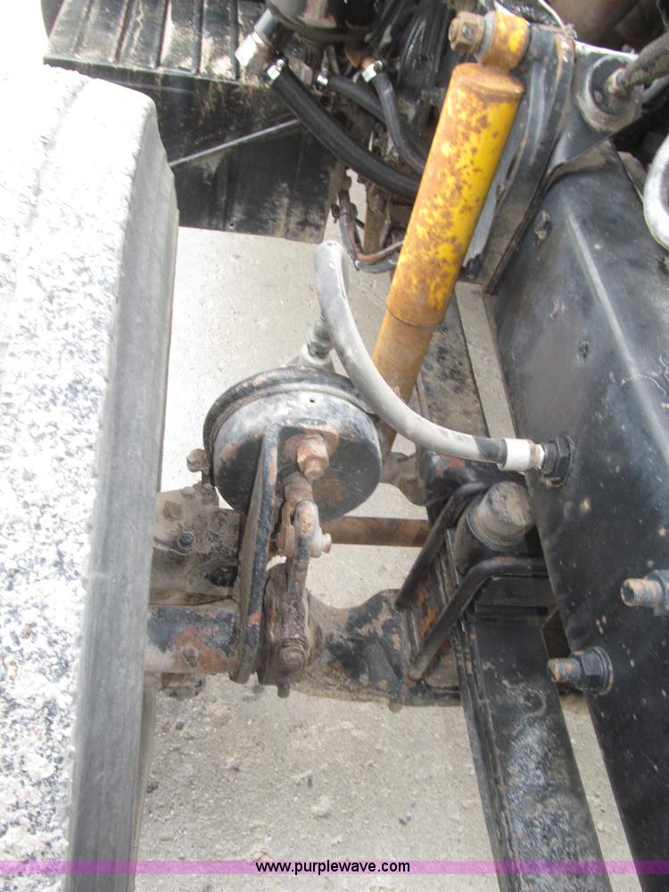 image for item F7122 1985 Mack RD688S Econodyne triple axle semi truck