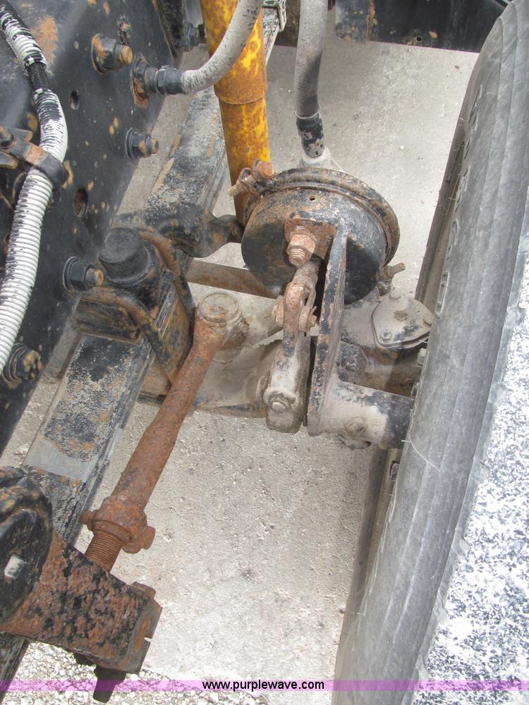 image for item F7122 1985 Mack RD688S Econodyne triple axle semi truck