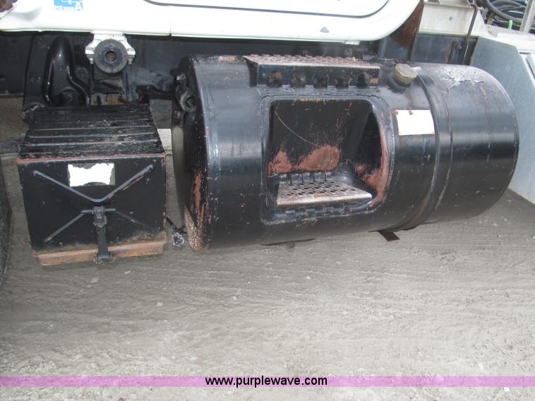 image for item F7122 1985 Mack RD688S Econodyne triple axle semi truck