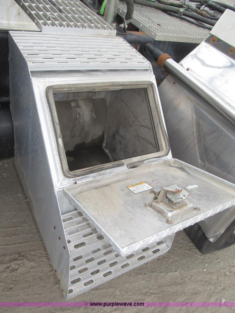 image for item F7122 1985 Mack RD688S Econodyne triple axle semi truck