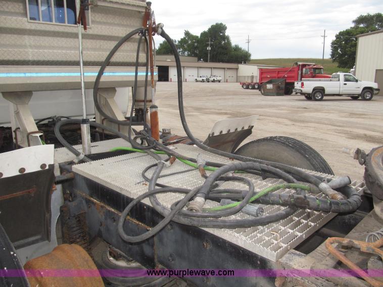 image for item F7122 1985 Mack RD688S Econodyne triple axle semi truck