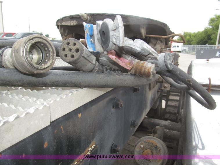 image for item F7122 1985 Mack RD688S Econodyne triple axle semi truck