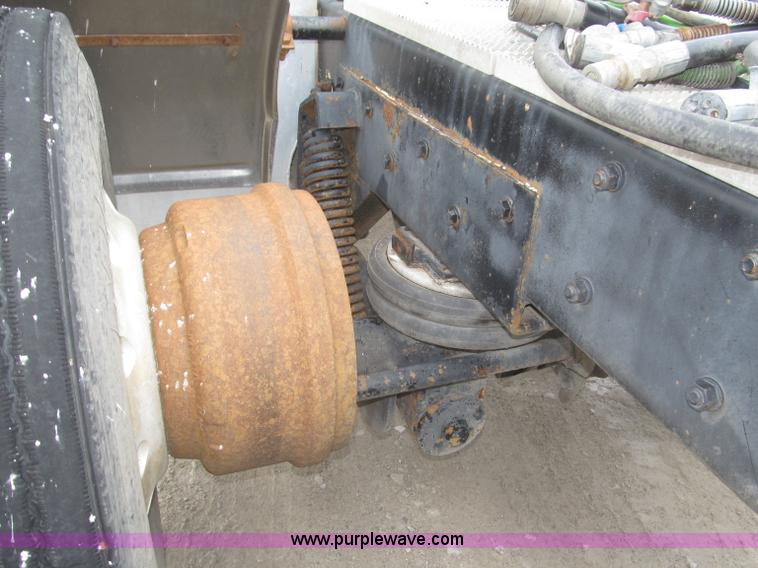 image for item F7122 1985 Mack RD688S Econodyne triple axle semi truck