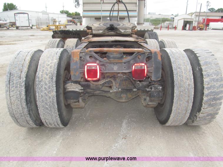 image for item F7122 1985 Mack RD688S Econodyne triple axle semi truck