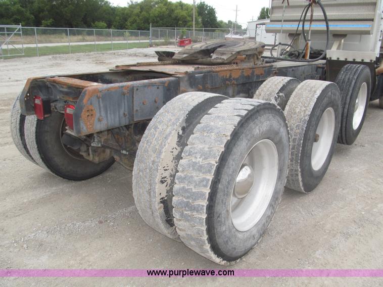 image for item F7122 1985 Mack RD688S Econodyne triple axle semi truck