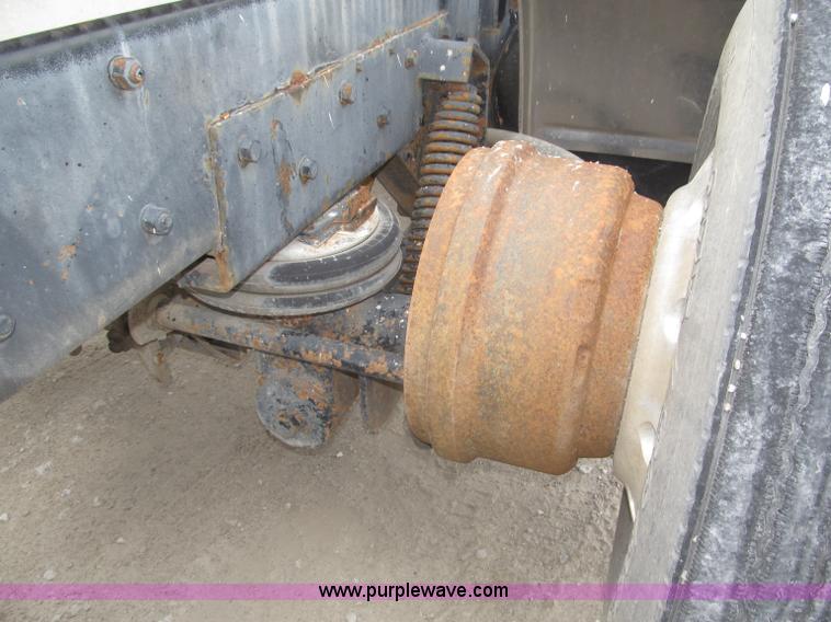 image for item F7122 1985 Mack RD688S Econodyne triple axle semi truck