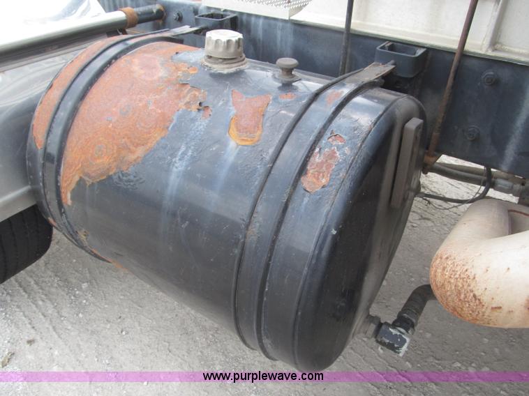 image for item F7122 1985 Mack RD688S Econodyne triple axle semi truck