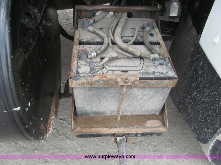 image for item F7122 1985 Mack RD688S Econodyne triple axle semi truck