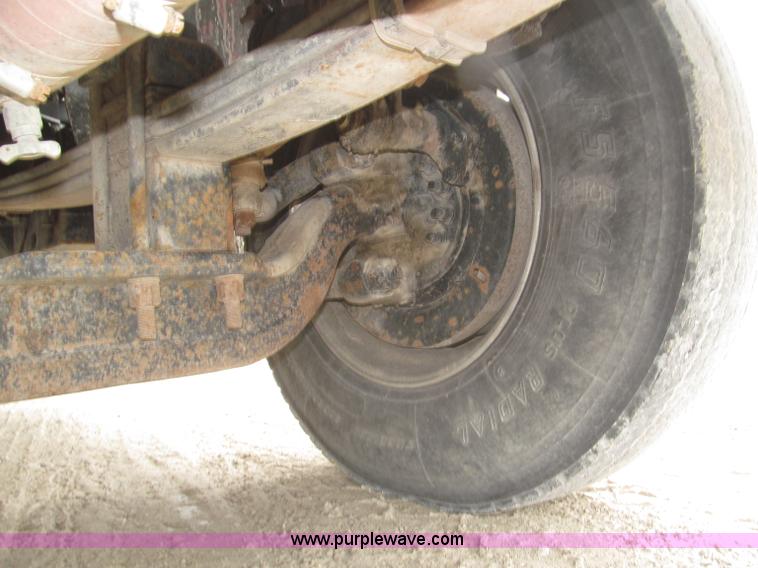 image for item F7122 1985 Mack RD688S Econodyne triple axle semi truck