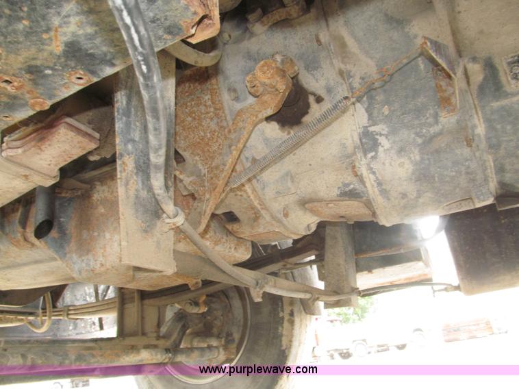 image for item F7122 1985 Mack RD688S Econodyne triple axle semi truck