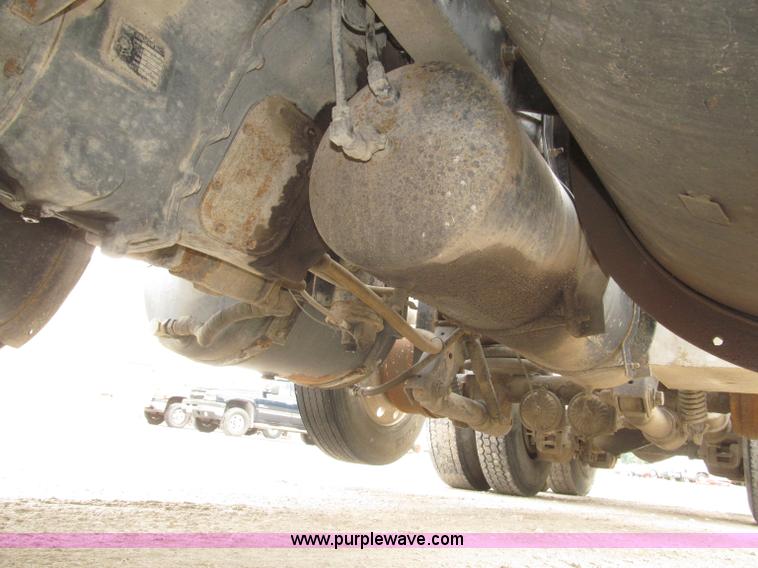 image for item F7122 1985 Mack RD688S Econodyne triple axle semi truck