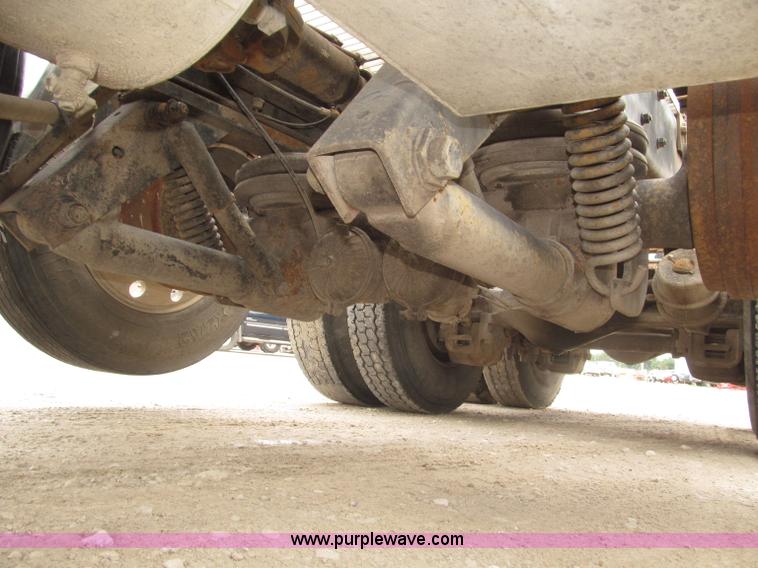 image for item F7122 1985 Mack RD688S Econodyne triple axle semi truck