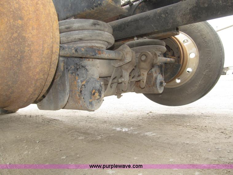 image for item F7122 1985 Mack RD688S Econodyne triple axle semi truck