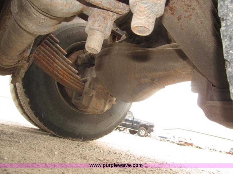 image for item F7122 1985 Mack RD688S Econodyne triple axle semi truck