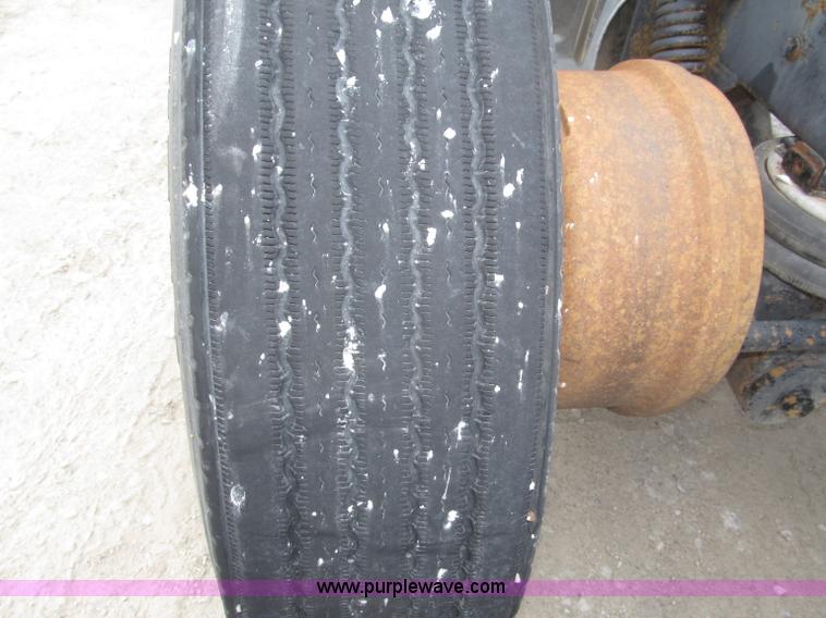 image for item F7122 1985 Mack RD688S Econodyne triple axle semi truck