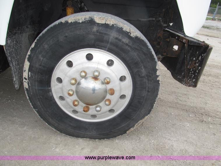 image for item F7122 1985 Mack RD688S Econodyne triple axle semi truck