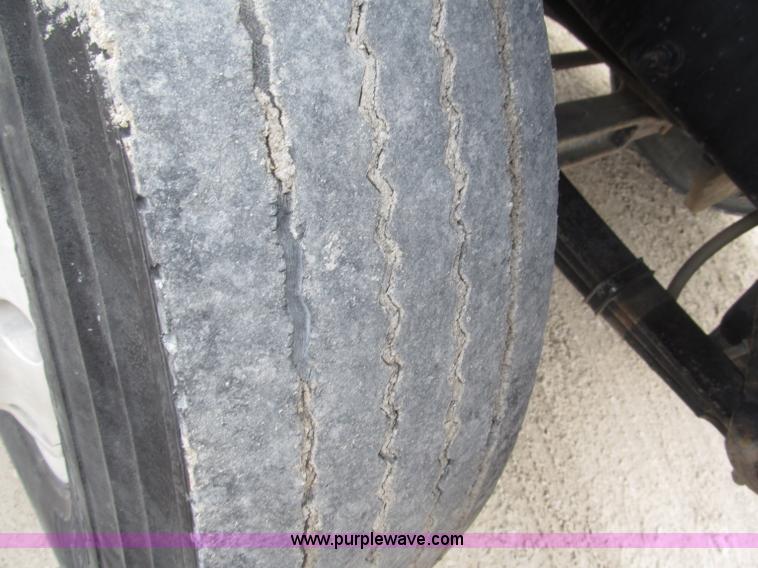 image for item F7122 1985 Mack RD688S Econodyne triple axle semi truck