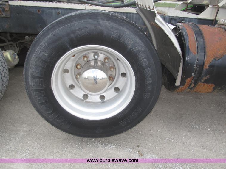 image for item F7122 1985 Mack RD688S Econodyne triple axle semi truck